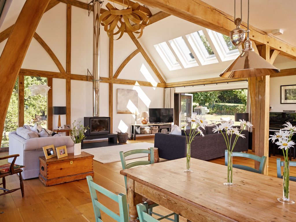 oak framed living room with vaulted ceiling