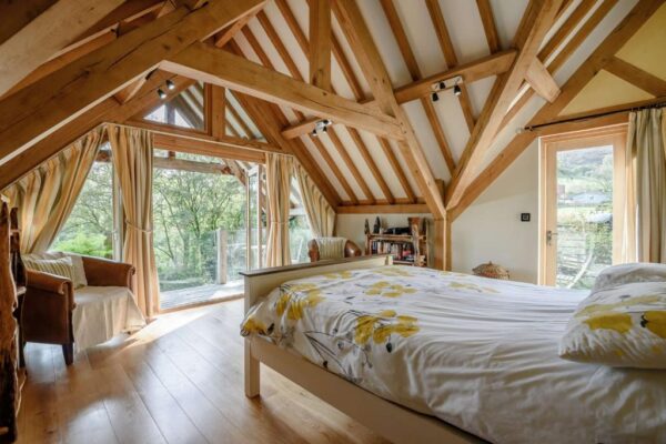 oak frame bedroom with exposed beams