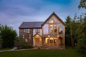 Glazed 2 storey oak extension. Bespoke Oak Frame House