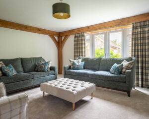 Oak framed building. Contemporary oak frame house Oak beams. Oak lounge. Modern oak sitting room.Contemporary living